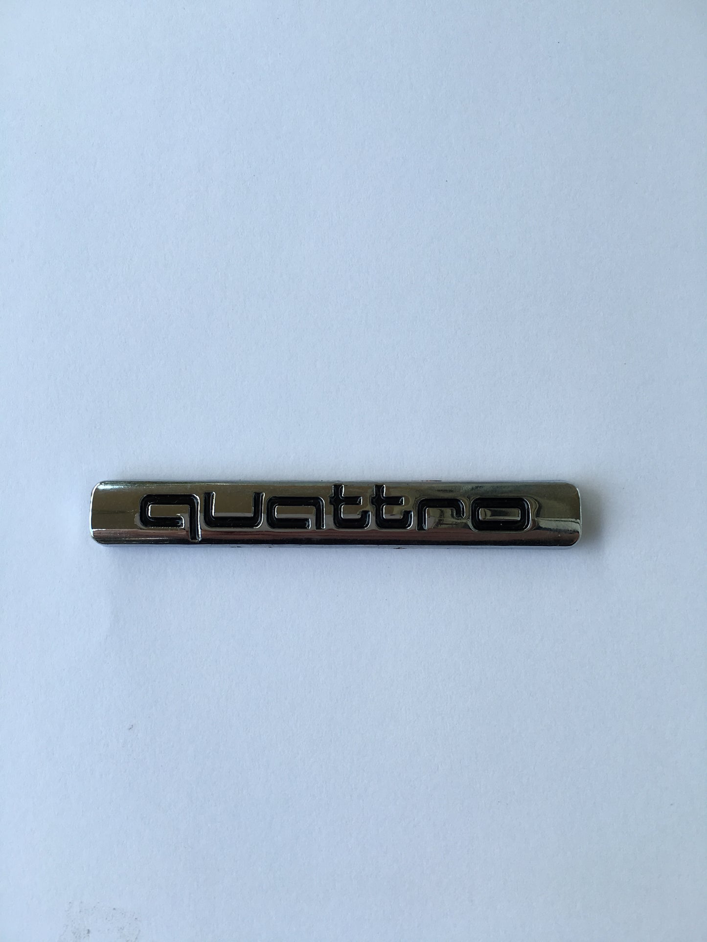 Audihoz Quattro embléma