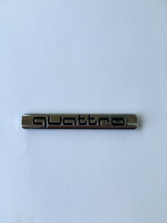 Audihoz Quattro embléma
