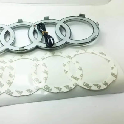 Audi LED első hűtőrács logó – matt fekete – fehér LED világítással – 273 mm