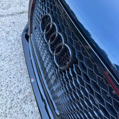 Audi első hűtőrács logó – Fényes fekete, 273 mm (Grill Rács Embléma)